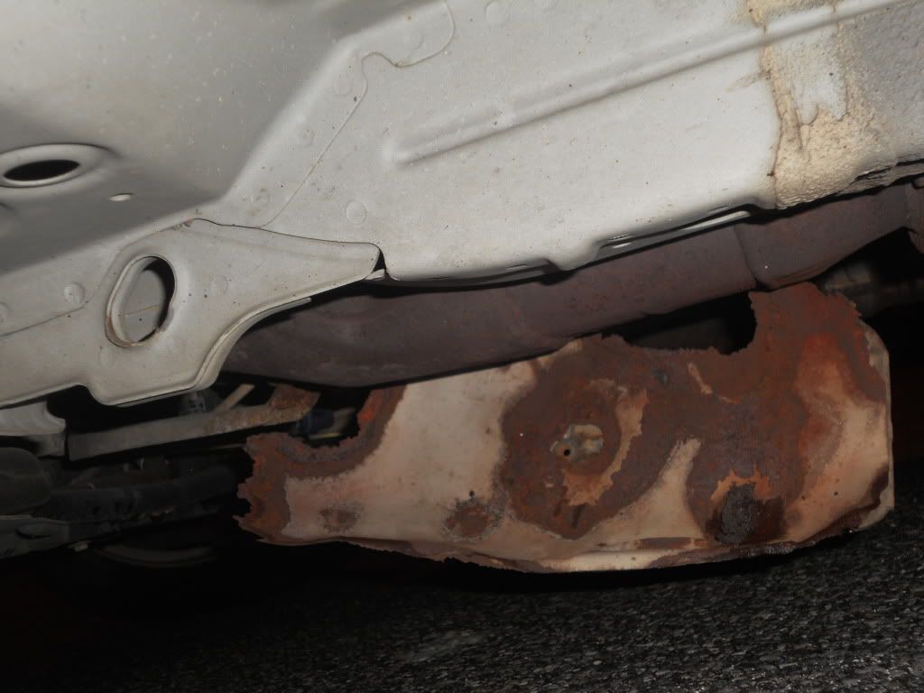 something hanging under my car!!!!!!?? Nissan Forum Nissan Forums